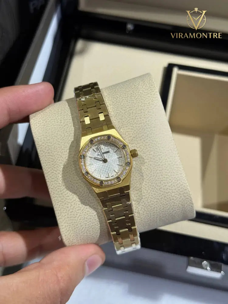 Audemars Piguet mini lunette serti Gold