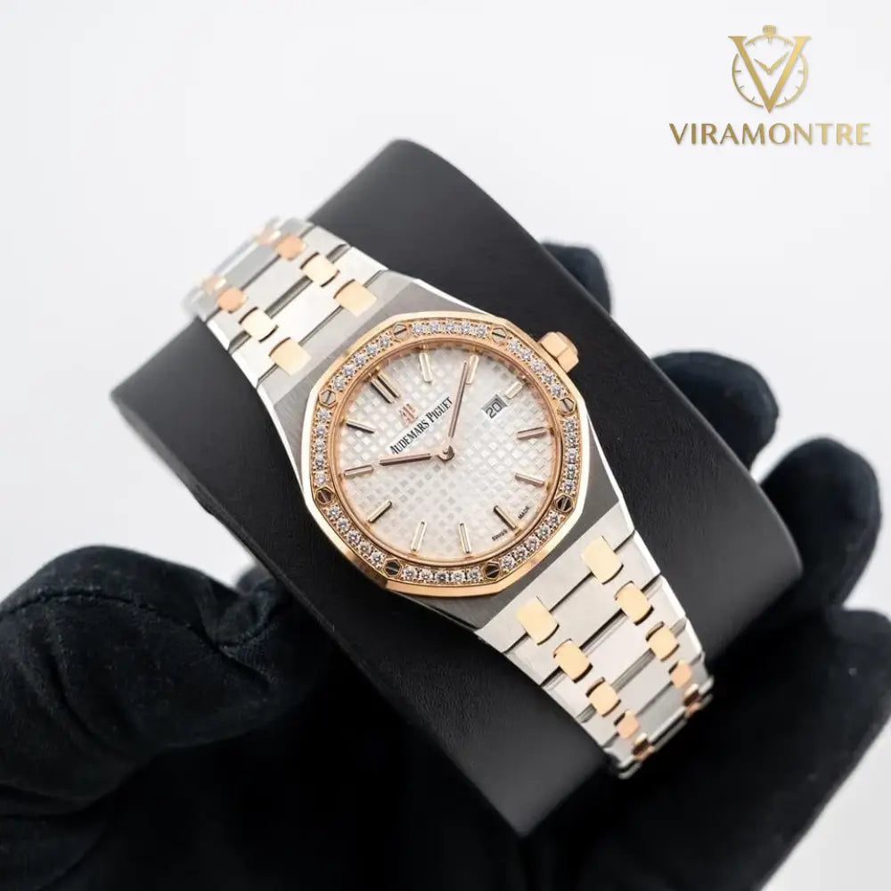 Audemars Piguet Royal Oak Silver toned Dial Steel and Gold Diamond Bezel 33mm