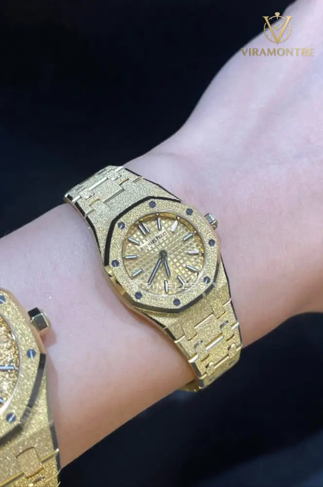 Montre Audemars Piguet Royal Oak Mini 67630BA.GG.1312BA.01 en or jaune givré 23 mm pour femme
